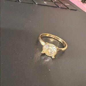 Elegant Gold Ring with Clear Gemstone